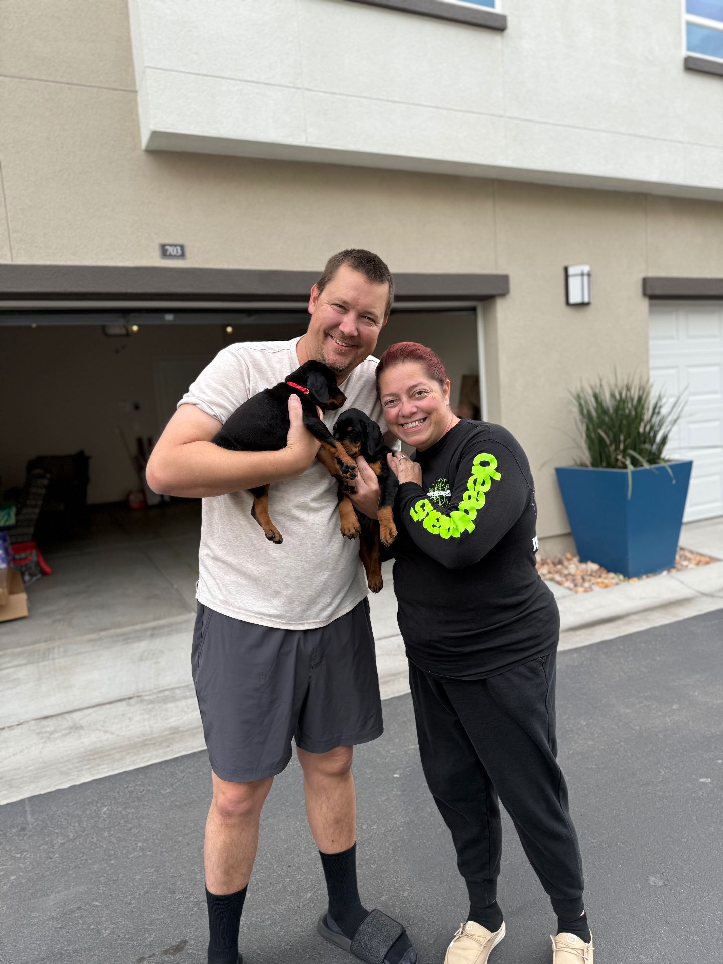 Phenomenal Doberman puppies going home with their smiling new family outside the house